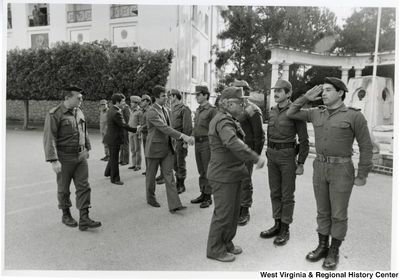 Congressman Nick Rahall, Congressman Toby Moffett and General Khoury shaking the hands of the men in the Lebanese Army.