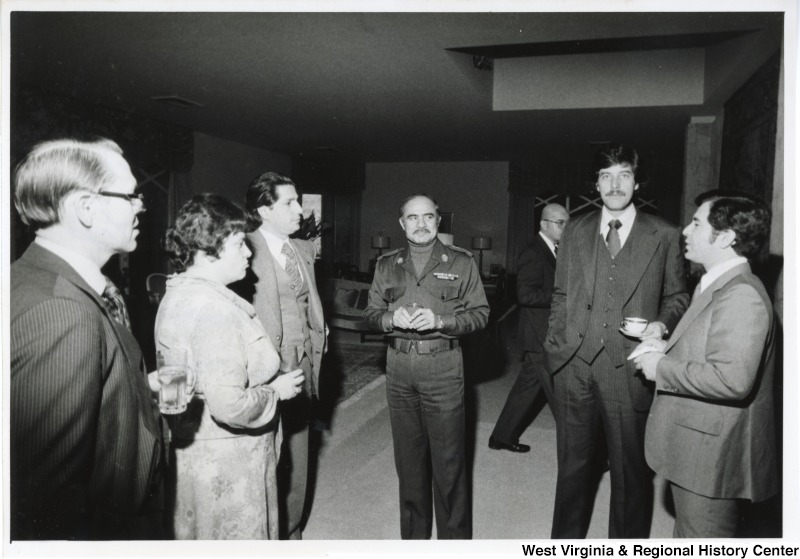 From left to right: Jim Collins the U.S. State Department escort for the trip, Congresswoman Mary Rose Oakar, Amin Geymagel of the Lebanese parliament, the Lebanese Army Liaison, Congressman Bob Carr and Congressman Nick Rahall. They are at the U.S. Ambassador's house, which is where they lodged during their stay in Beirut.