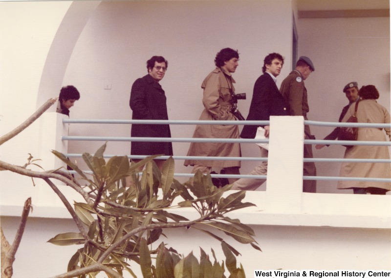 From left to right: Congressman Nick Rahall (D-WV); Congressman Bob Carr (D-MI); Congressman Toby Moffett (D-CT); and Congresswoman Mary Rose Oakar (D-OH). They are entering the United Nations Interim Force in Lebanon (UNIFIL) headquarters for a briefing on the United Nations forces in Lebanon.