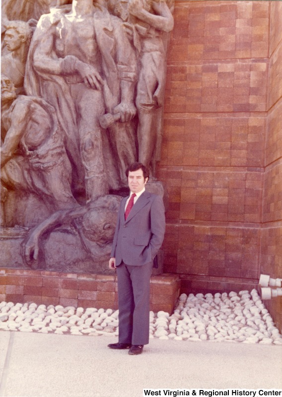 Congressman Nick Rahall Ii standing beside the Rapoport's Memorial to the Warsaw Ghetto Uprising at Yad Vashem, Israel's memorial to the Holocaust victims.