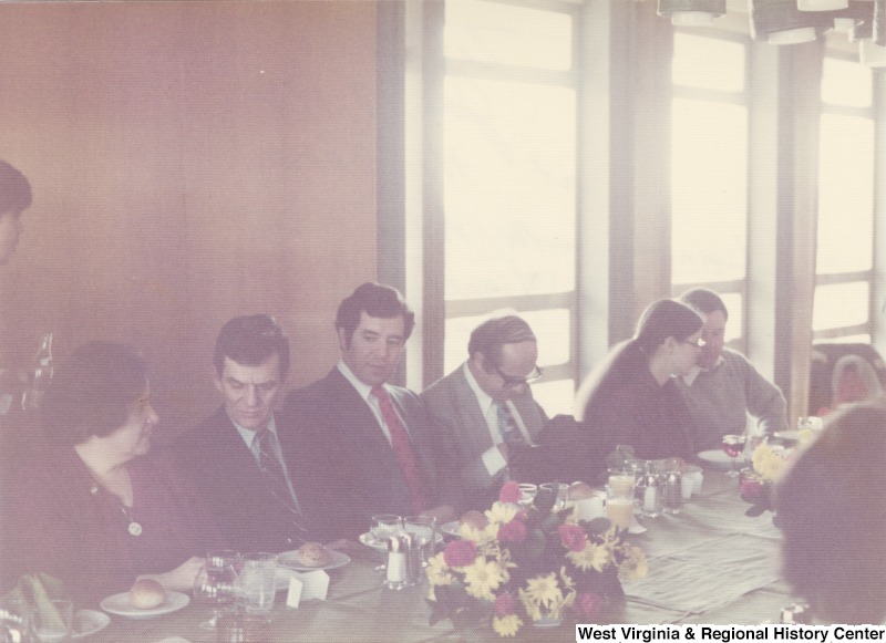 From left to right: Congresswoman Mary Rose Oakar; Unidentified Israeli politician and member of Parliament; Congressman Nick Rahall; unidentified Israeli guide; Ann Seneese, aide to Congressman Toby Moffett; and Colonel Bob Miller, USAF guide for the trip. They are having lunch at the Knesset with Acting Prime Minister Yigael Yadin (not pictured).