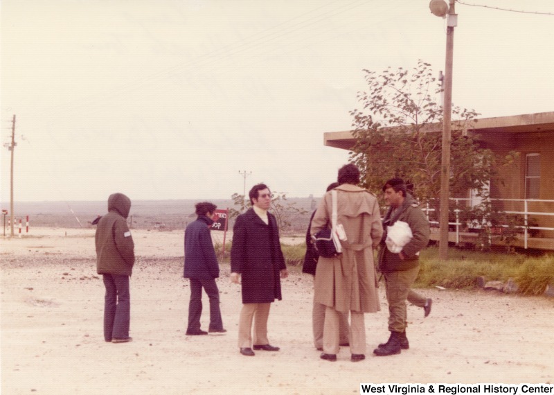 Congressman Nick Rahall, Congressman Toby Moffett (hidden by Carr) and Congressman Bob Carr at the Israeli Army Camp during the Golan Heights tour.