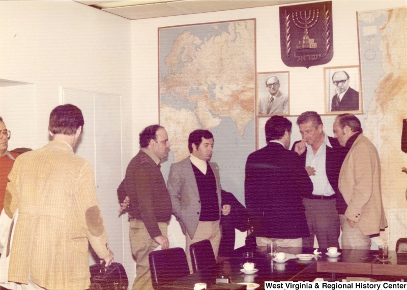 From left to right: unidentified Israeli aide; Congressman Nick Rahall; Congressman Toby Moffett; Israeli Defense Minister Ezer Weizman; and U.S. Ambassador Sam Lewis in Weizman's office.