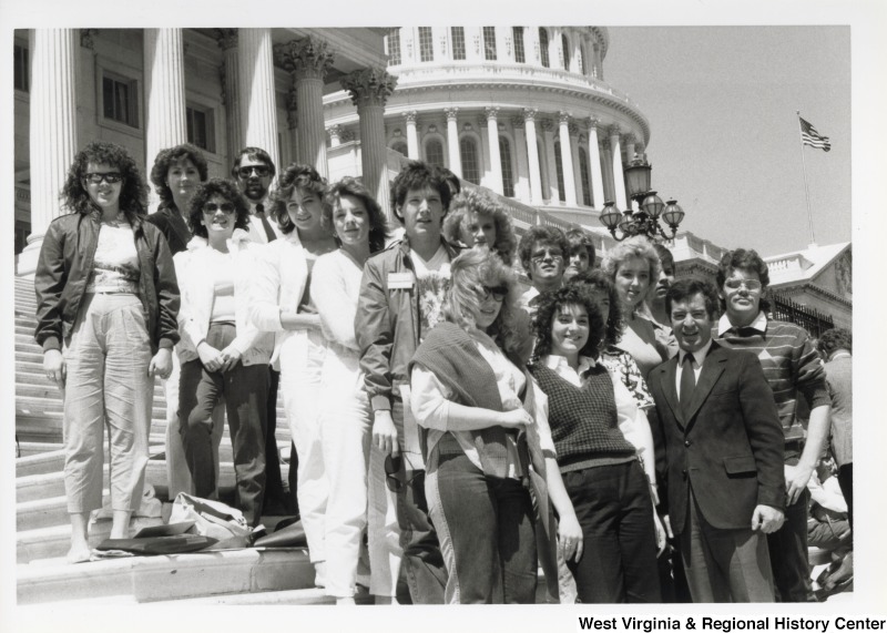 Congressman Nick Rahall II with a group of high school students on the steps of the United States Capitol.