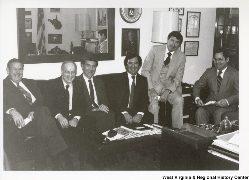 From left to right: Congressman Jack Murtha (D-PA), two unidentified men (may be from coal regulation/Environment Protection Agency); Congressman Nick Rahall II (D-WV); Senator Austin Murphy (D-PA); and Congressman Alan Mollohan (D-WV). They are meeting in Congressman Rahall's office to discuss coal legislation.