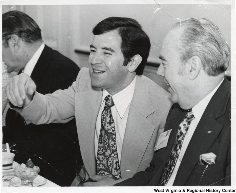 Congressman Nick Rahall II (left) laughing with Willard Erwin at the West Virginia Accountant Breakfast.