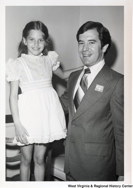 Congressman Nick Rahall II with a unidentified little girl.