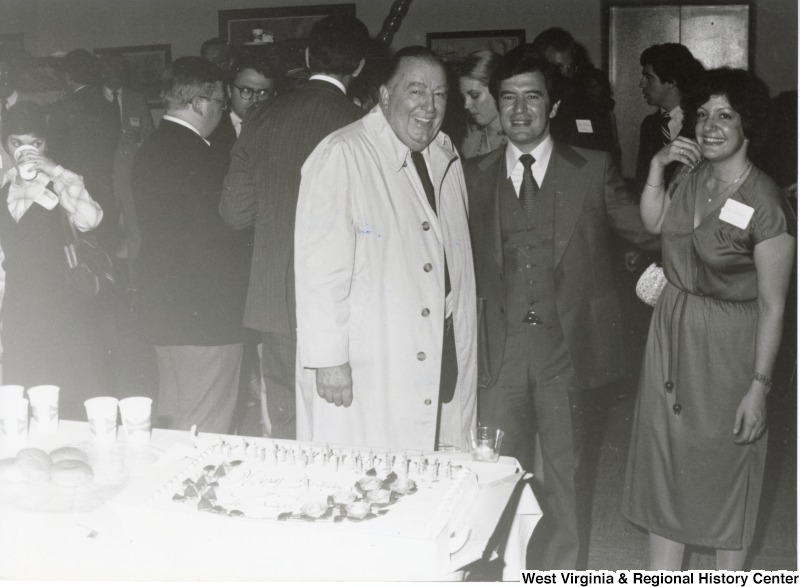 From left to right: Senator Jennings Randolph, Congressman Nick Rahall II, and Vickie, Rahall's sister. They are at Rahall's 30th birthday party.