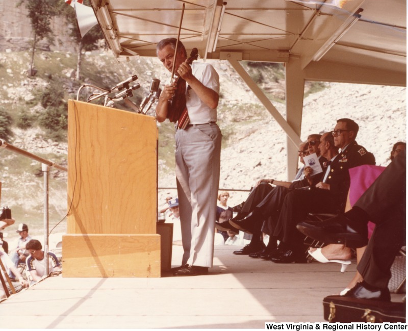 Senator Robert C. Byrd playing the fiddle at an event in West Virginia.