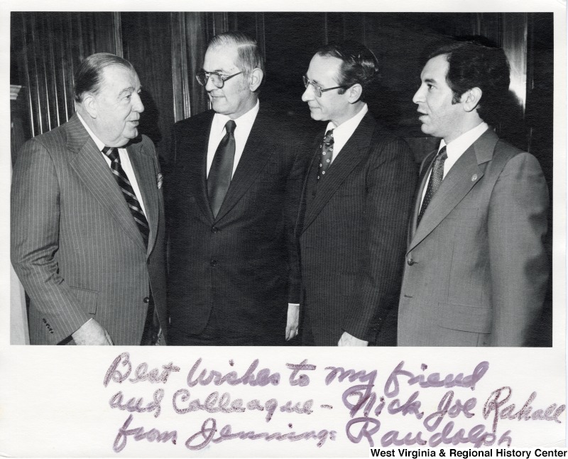 From left to right: Senator Jennings Randolph; Joe Powell, then President of AFL/CIO; Steve Cook, West Virginia Commissioner of Labor; and Congressman Nick Rahall II. Photograph is signed 'Best wishes to my friend and colleague - Nick Joe Rahall from Jennings Randolph.'