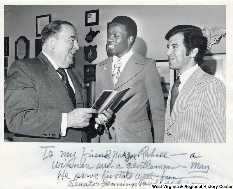 Senator Jennings Randolph, an unidentified youth and Congressman Nick Rahall II in Randolph's office in Washington, D.C.The photograph is signed 'To my friend Nick Joe Rahall - a winner and a gentleman - may he serve his state well - from Senator Jennings Randolph.'