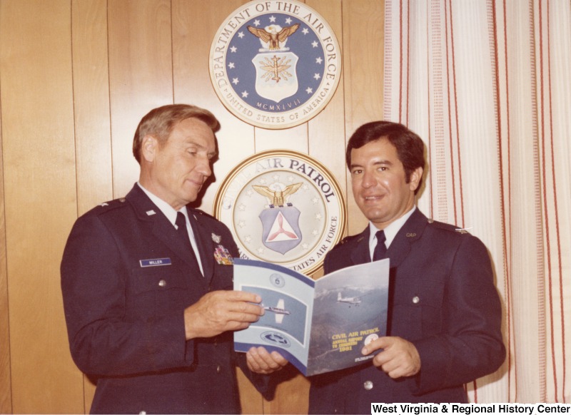 Congressman Nick Rahall II with a Civil Air Patrol member, last name Miller.