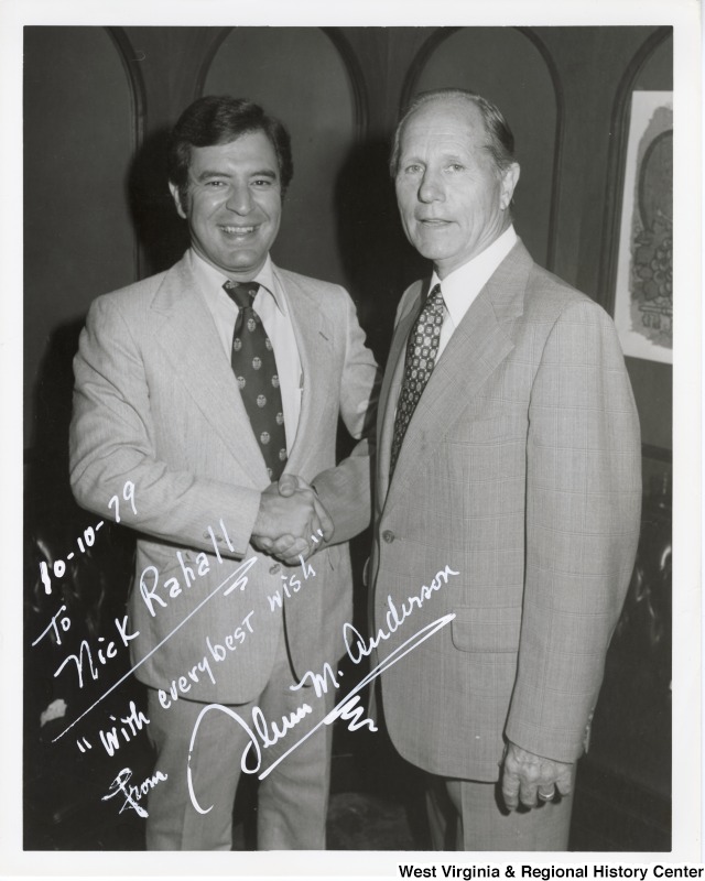 Congressman Nick Rahall II shaking the hand of Congressman Glenn Anderson (D-CA), Chair of Transportation Subcommittee.  The photograph is signed "To Nick Rahall -- "With every best wish" from Glenn M. Anderson.