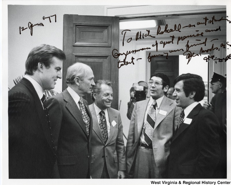 From left to right: Congressman Jim Guy Tucker (D-AK); Congressman Jack Brooks (D-TX), Chairman of House Judiciary Committee; Congressman Cecil Heftel (D-HI); Congressman Ted Weiss (D-NY) and Congressman Nick Rahall II (D-WV). Photograph is signed "To Nick Rahall - an outstanding Congressmen of great promise and talent - from your friend - Jack Brooks