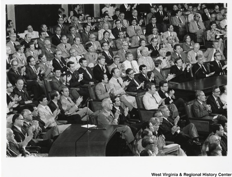 The State of the Union Address by President Jimmy Carter on the Camp David Middle East Agreements. Congressman Nick Rahall II is seated three rows from the right, fifth person from the right. To Rahall's left is Chairman George Mahon, and to the right is Congressman Lawrence H. Fountain (D-NC). Other identified representatives: Congressman Dan Rostenkowski; Congressman Tom Foley; Congressman John Brademus; Congressman Caroll Hubbard; Congressman Paul Simon; Congressman Sylvio Conte; Congressman Dick (Richard) Gephardt; Congressman Dale Kildee; Congressman Austen Murphy; Congressman Richard Ottinger; Congresswoman Elizabeth Holtzman; Congressman Bob (Milton Robert) Carr; Congressman Wyche Fowler; Congresswoman Mary Rose Oakar; Congressman Adam Benjamin; Congressman Claude Pepper: Congressman Jamie Whitten; and Congressman Elliott Levitas.