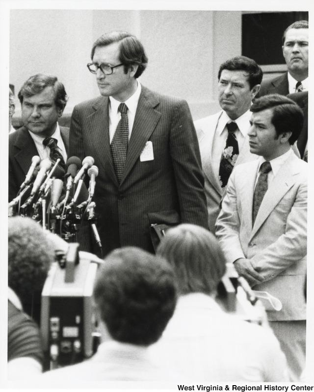 From left to right: Senator John Rockefeller (D-WV); Congressman Austin Murphy (D-PA); and Congressman Nick Rahall (D-WV) in front of a microphone speaking about coal.