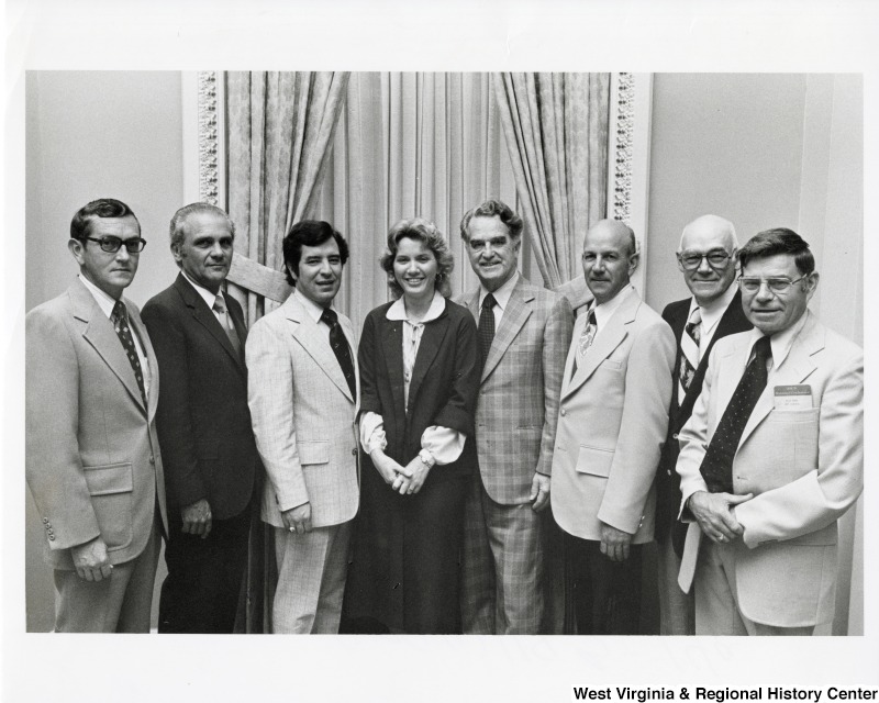 Congressman Bob Mollohan (fourth from the right) and Congressman Nick Rahall (third from the left) with West Virginians from Mollohan's district. This was possibly taken at the ASCS National Conference.