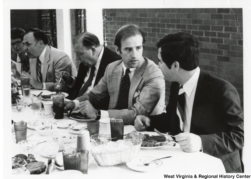 From left to right: Marshall University President Robert Hayes; Senator Jennings Randolph (D-WV); Senator Joe Biden (D-DE); and Congressman Nick Rahall (D-WV) at a Marshall University graduation meal.