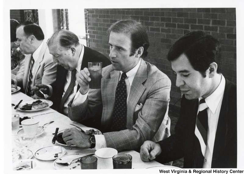 From left to right: Marshall University President Robert Hayes; Senator Jennings Randolph (D-WV); Senator Joe Biden (D-DE); and Congressman Nick Rahall (D-WV) at a Marshall University graduation meal.