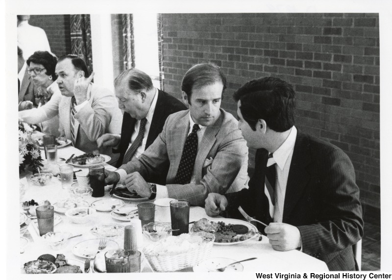 From left to right: Marshall University President Robert Hayes; Senator Jennings Randolph (D-WV); Senator Joe Biden (D-DE); and Congressman Nick Rahall (D-WV) at a Marshall University graduation meal.