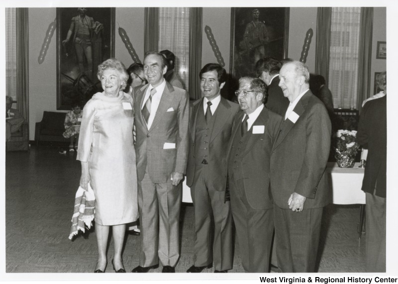 From left to right: Mrs. Ruth Watt, Chief Clerk; Majority Leader Jim Wright (D-TX); Congressman Nick Rahall II (D-WV); Rahall's Father; and Mr. Walter Watt at Rahall's 30th birthday party fundraiser.