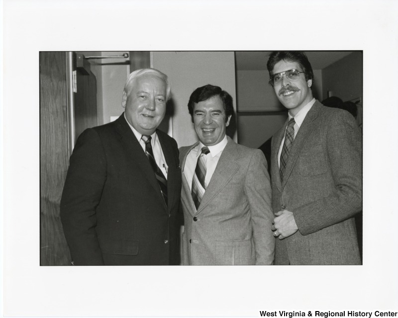 Congressman Nick Rahall II (center) with two unidentified men.