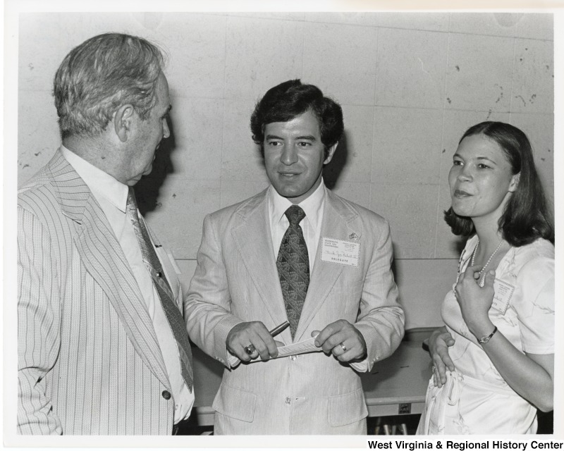 Congressman Nick Rahall II (center), his wife, Helen, and an unidentified man at the Democratic State Convention.