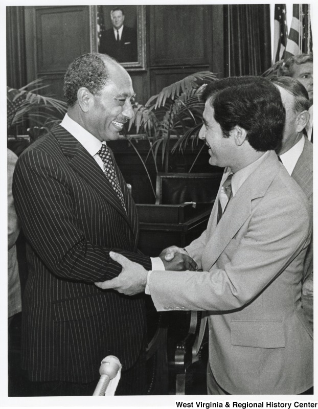 Congressman Nick Rahall II shaking the hand of Egyptian President Anwar Sadat.