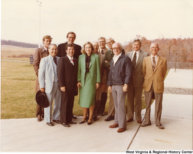 From left to right: Beckley Mayor John H. McCulloch; House of Delegate member Paul Vonnar?; Governor Jay Rockefeller IV; Congressman Nick Rahall II; Sharon Percy Rockefeller; former W.V. Governor Hulett Smith; House of Delegate member Paul Hutchinson; Raleigh County sheriff Claude England; House of Delegate member Vernon Bailey; Ike Southern of WCIR Radio; and Leighton Farley Sr, of COMPAC-UMWA (United Mine Workers of America).Governor Jay Rockefeller's victory thank you meet up at the Raleigh County Memorial Airport. Rockefeller was elected for his third term.