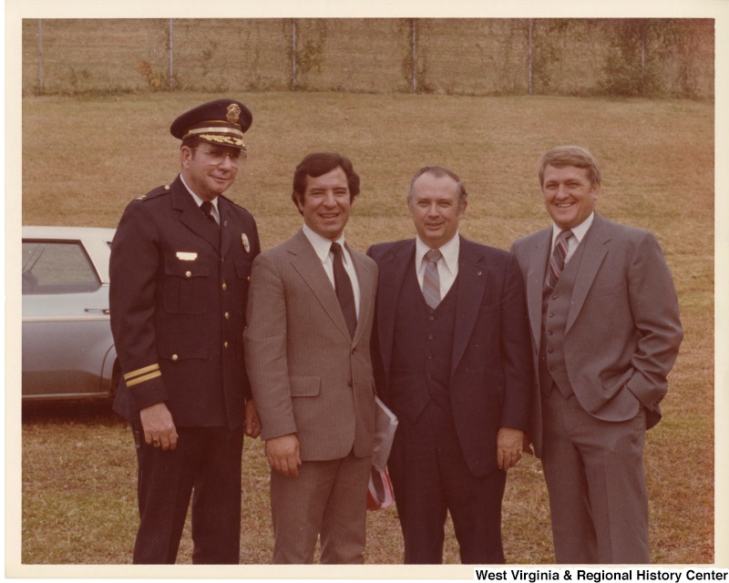 From left to right: Captain Don Norris, Congressman Nick Rahall II, City manager Dick Barton, and Chief Ottie Adkins in Huntington, W.Va.