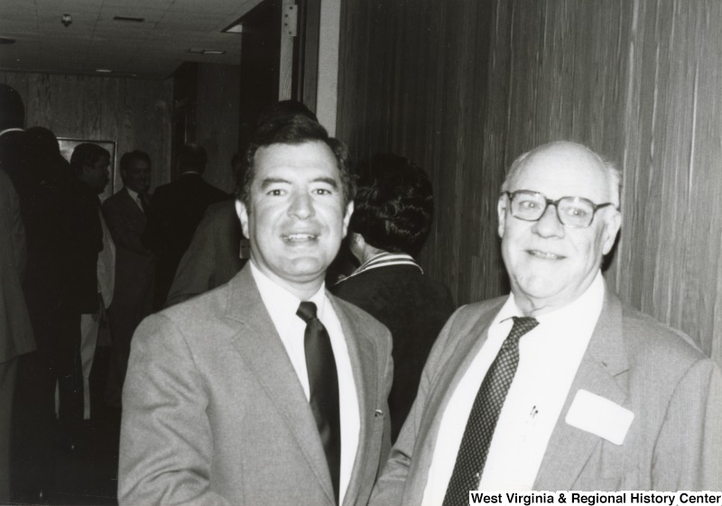 Congressman Nick Rahall II (left) with an unidentified man at his birthday party.