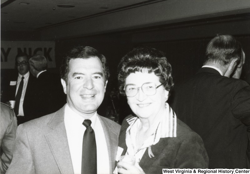 Congressman Nick Rahall II with an unidentified woman at his birthday party.