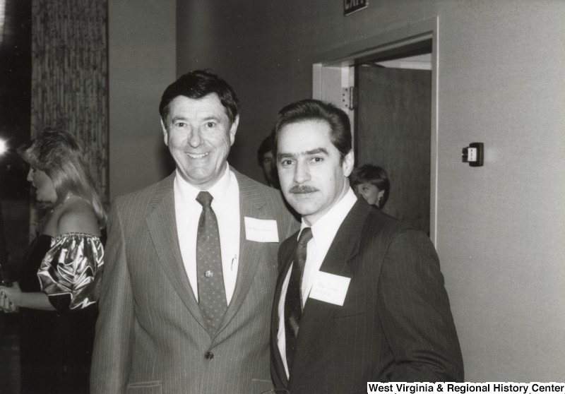 Congressman Austin Murphy (left) with Bob Cark, NAAA (right), at Congressman Nick Rahall's birthday party.