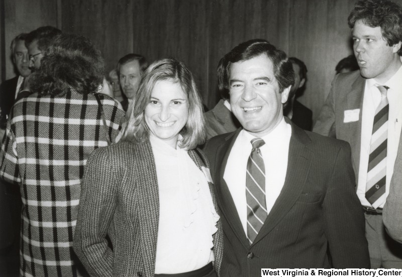 Congressman Nick Rahall II with an unidentified woman at his birthday party.