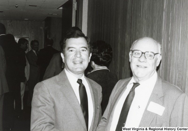 Congressman Nick Rahall II (left) with an unidentified man at his birthday party.