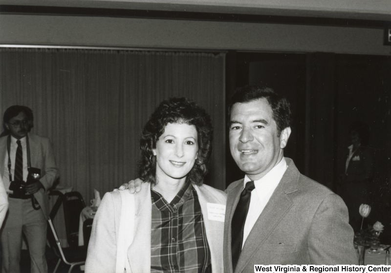 Congressman Nick Rahall II with an unidentified woman at his birthday party.