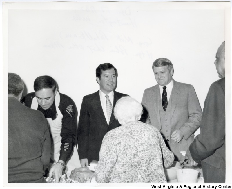 Congressman Nick Rahall, II and Huntington Chief of Police Ottie Adkins with an unidentified man.