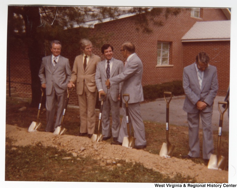 From left to right is Senator Robert C. Byrd, Miles Dean from Governor John D. Rockefeller's office, Congressman Nick Rahall, II, O. V. Lilly, and Mason Lilly at groundbreaking for the Crab Orchard-MacArthur Public Service District building.