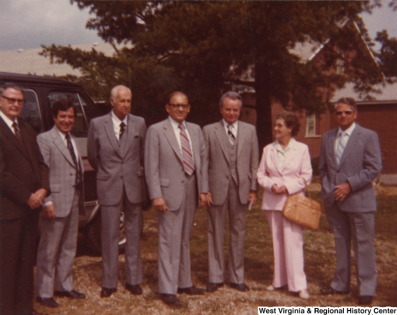 Congressman Nick Rahall, II (second from left), Senator Robert C. Byrd (fifth from left), with an unidentified group of people at the Crab Orchard-MacArthur PSD Groundbreaking.