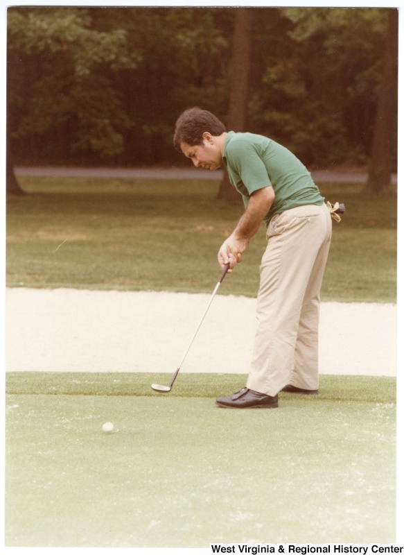 Congressman Nick Rahall, II golfing at the 1984 Congressional Golf Tournament.