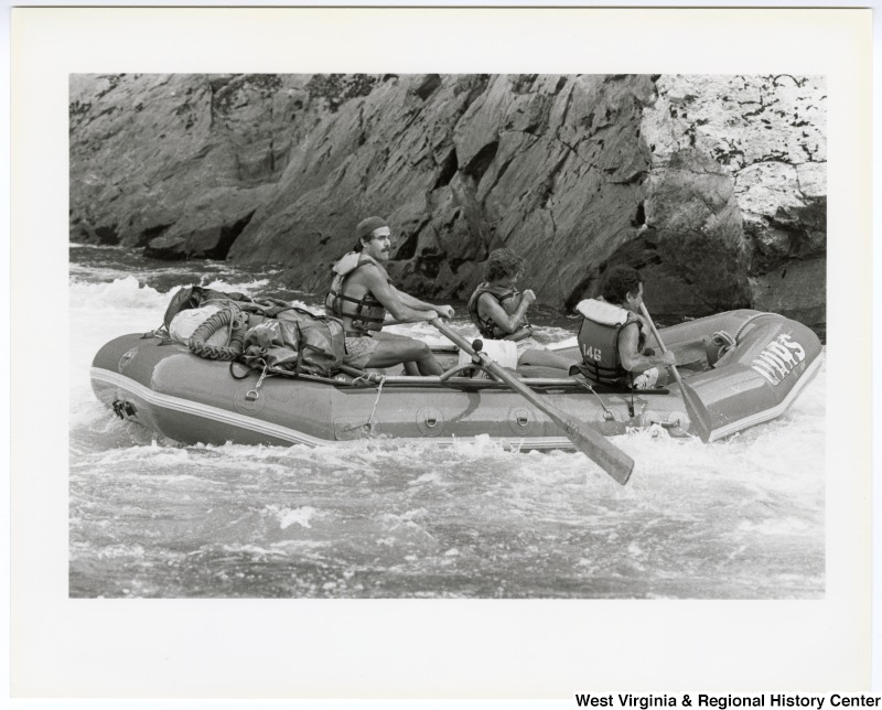 Congressman Nick Rahall, II (right) whitewater rafting down the Tuolumne River in central California.