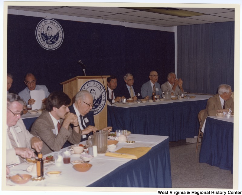 Congressman Nick Rahall, II (fourth from right in back row) at a banquet during the groundbreaking ceremony for the Beckley Sewage Treatment plant.