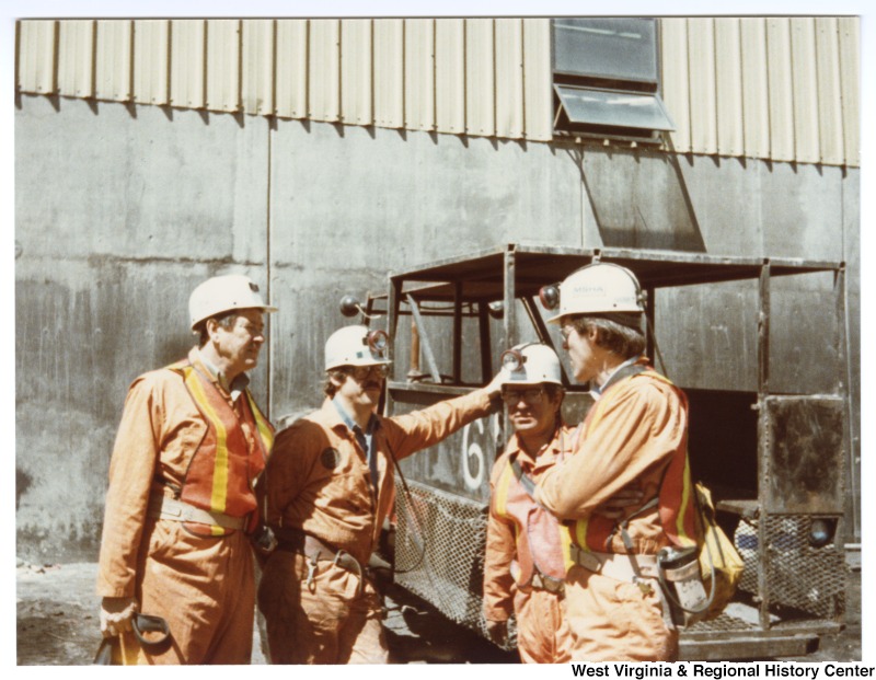 Congressman Nick Rahall, II (second from right) and three unidentified men at Rocky Mountain Energy Company.