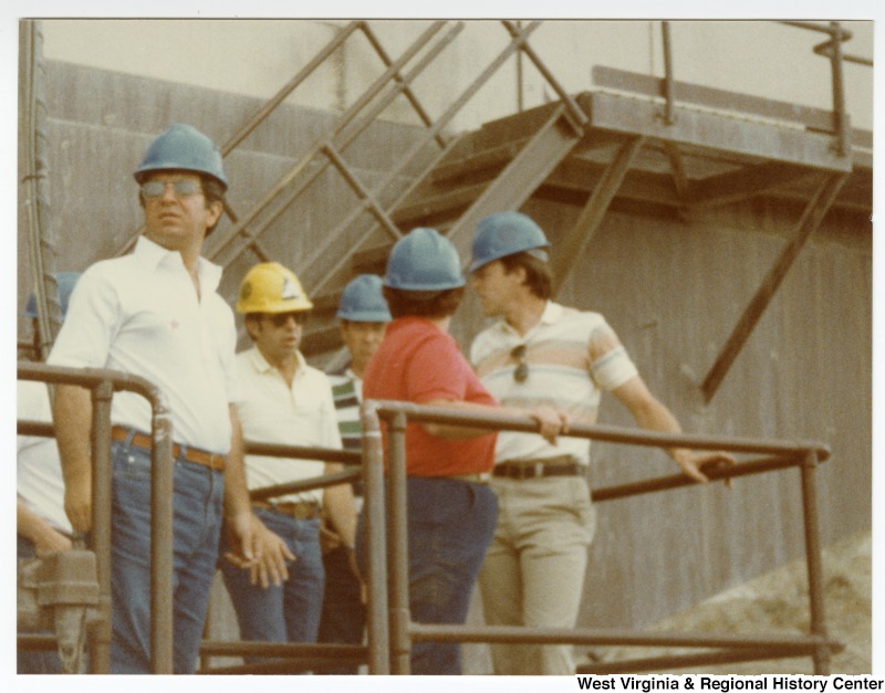 Congressman Nick Rahall, II (left) and three unidentified men and one unidentified woman on a tour at Rocky Mountain Energy Company.