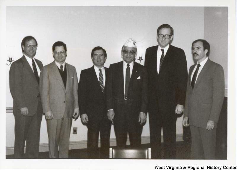 Congressman Nick Rahall, II (third from left), Senator Jay Rockefeller, IV (second from right), and Congressman Bob Wise (first on the right) with three unidentified men.