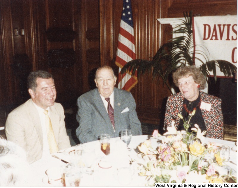 Congressman Nick Rahall, II (left), Senator Jennings Randolph (middle), and an unidentified woman (right) at a Davis and Elkins College dinner in Washington, D.C.