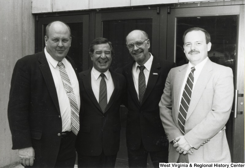 From left to right: Howard Green, International Executive Board Member for the United Mine Workers of America (UMWA), Congressman Nick Rahall, II, Bob Phalen, President of UMWA District 17, and Mike Browning, Vice President of UMWA District 17.Photo taken at a UMWA event at Marshall University.