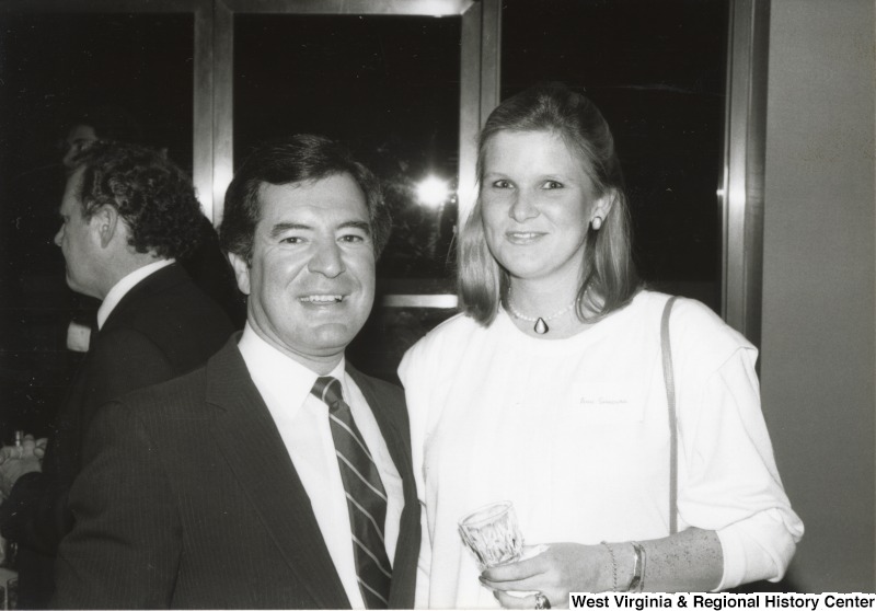 On the left, Representative Nick J. Rahall (D-W.Va.) stands for a photo with Ann Shadyac at an event.