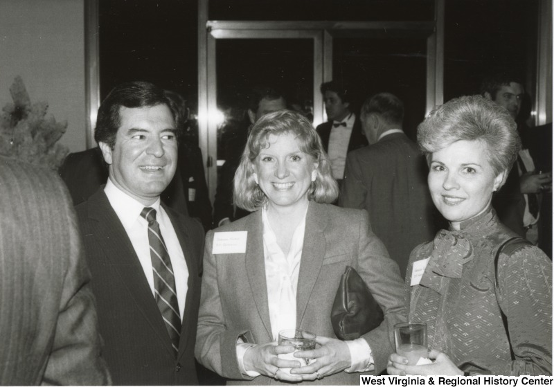 L-R: Representative Nick J. Rahall (D-W.Va.), Deborah Neale, lobbyist for B.F. Goodrich, and an unidentified woman lobbyist for B.F. Goodrich.