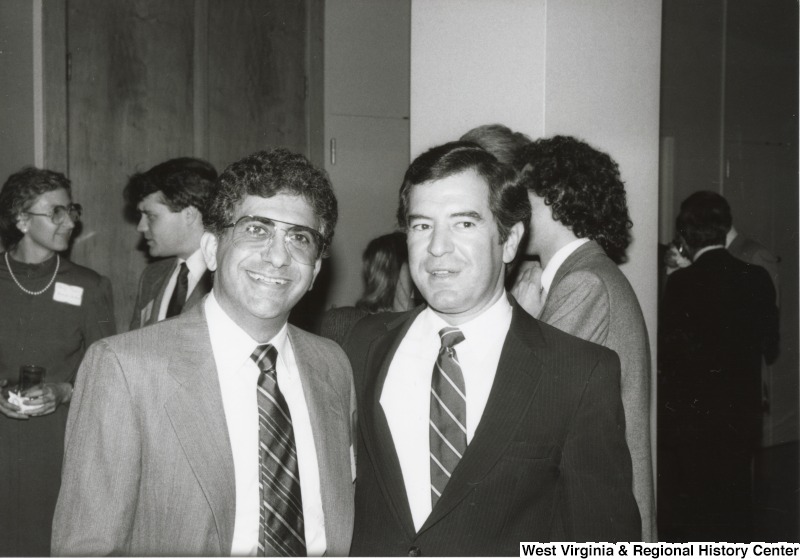 On the right, Representative Nick J. Rahall (D-W.Va.) with an unidentified man at an event.